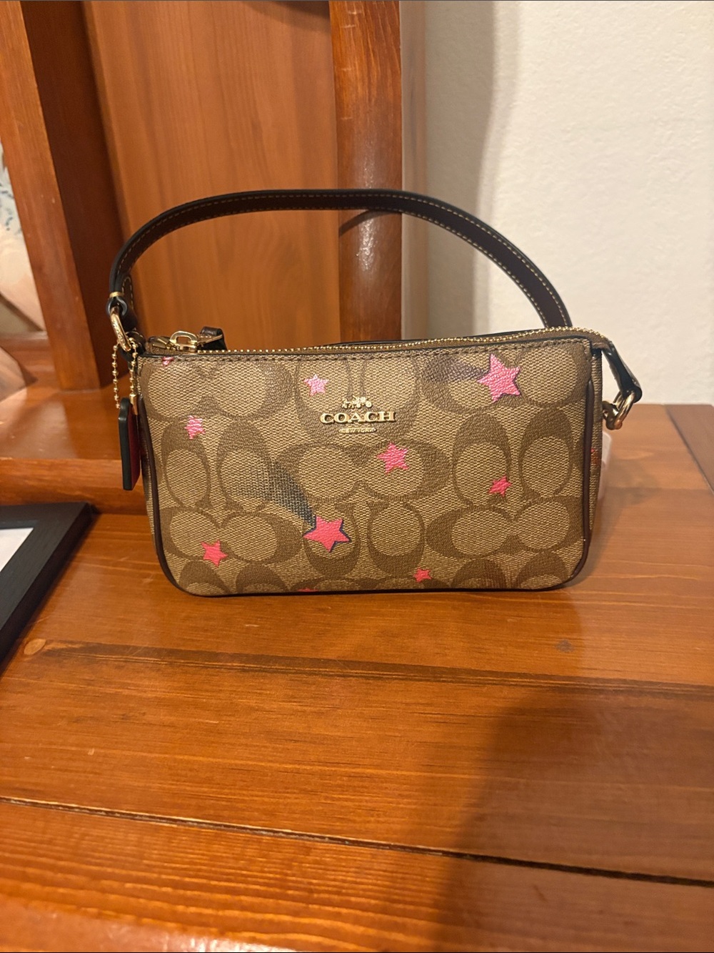 Coach Brown Signature Mini Wristlet with Pink Star Accents